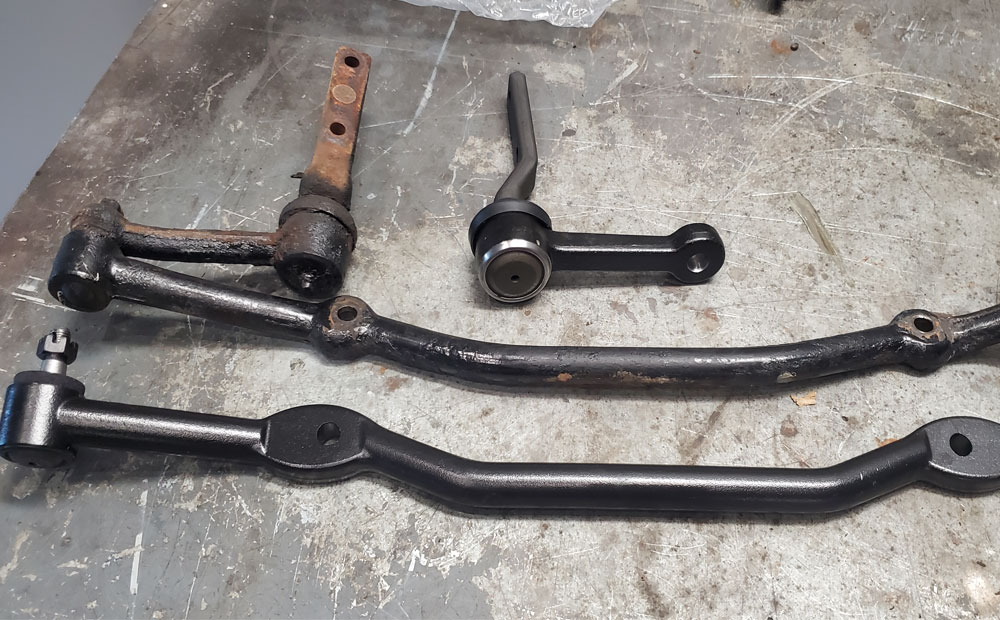 classic car repair / front end work - large diameter steering drag link and idler arm