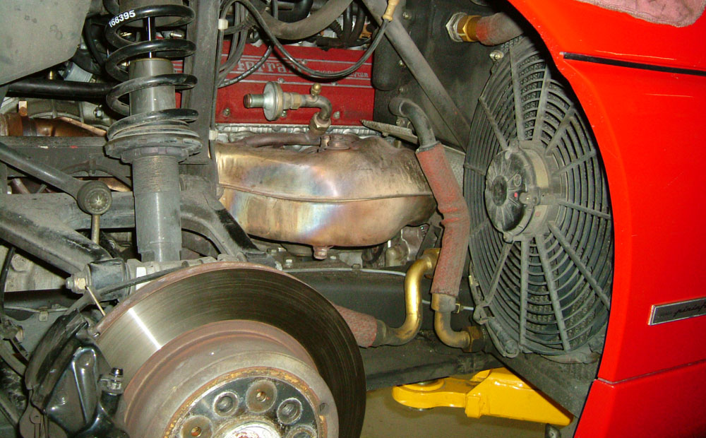 exotic car repair / Ferrari - engine exhaust manifold