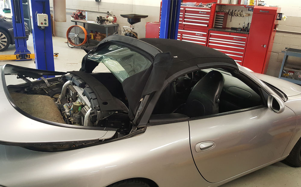 import car repair / Porsche 911 - convertible top repair