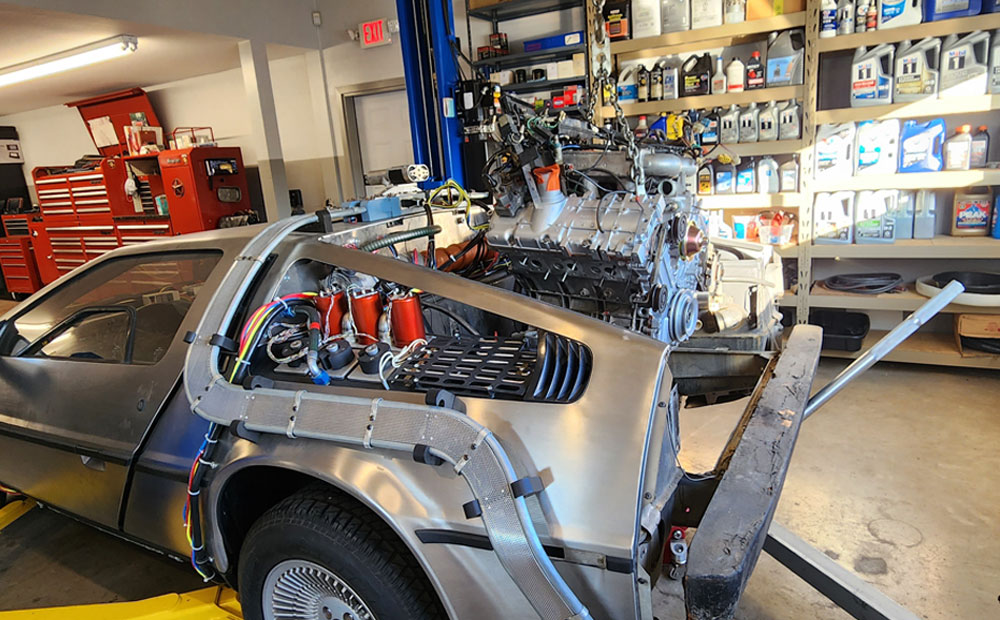 classic car repair / delorean dmc-12 - overhauled engine installation