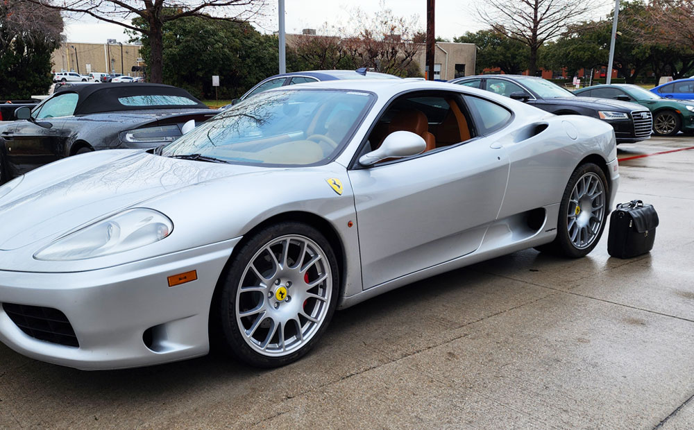 Briefcase inspecting Ferrari 360